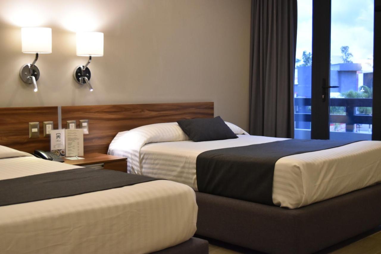 Estanza Hotel & Suites 莫雷利亚 外观 照片