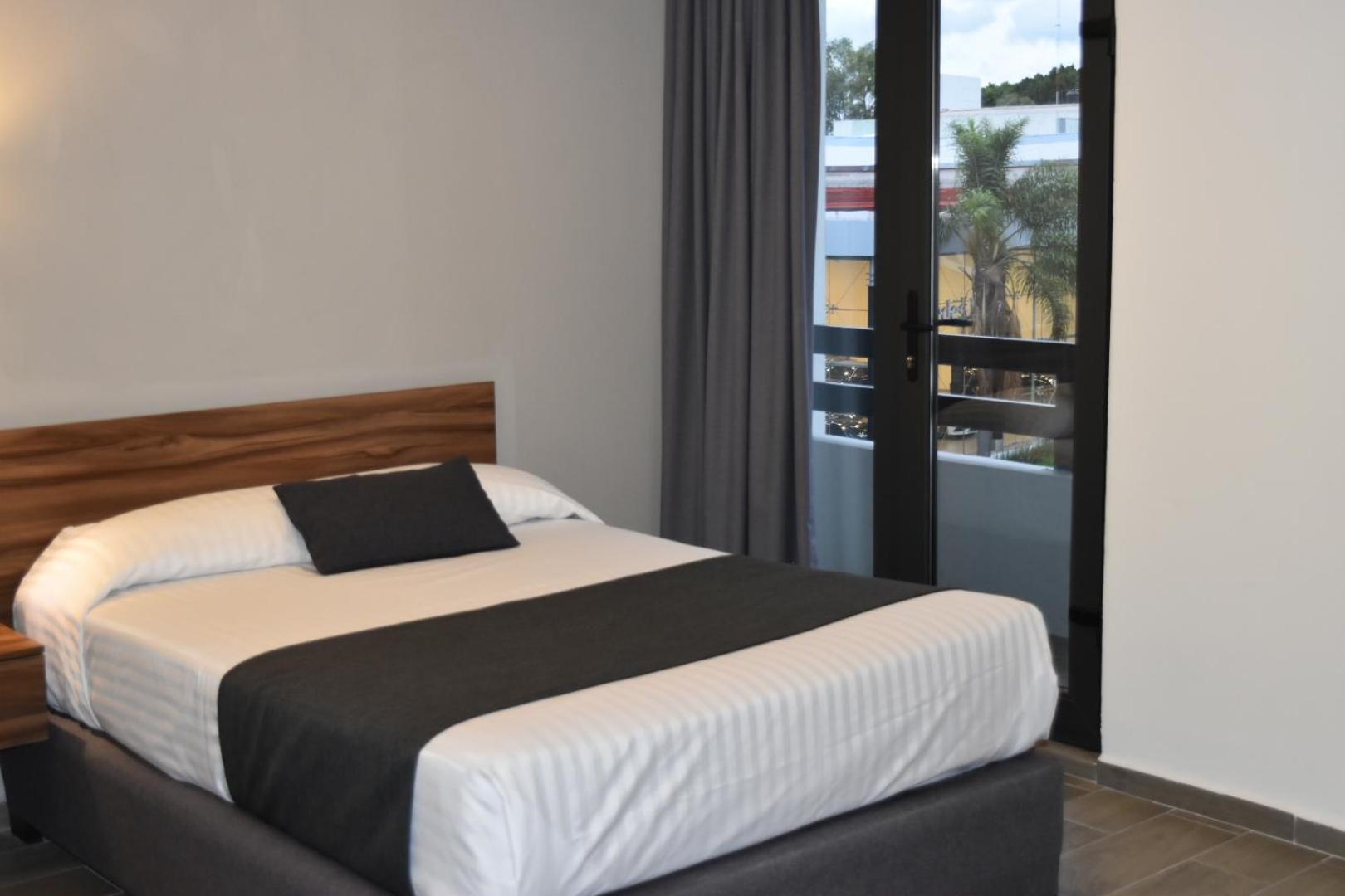 Estanza Hotel & Suites 莫雷利亚 客房 照片